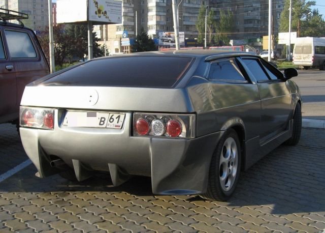 Тюнинг автомобилей на грани маразма (26 фото) 67023c0a810be.jpeg